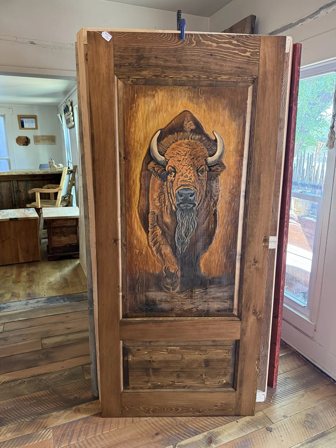 Carved buffalo solid wood door