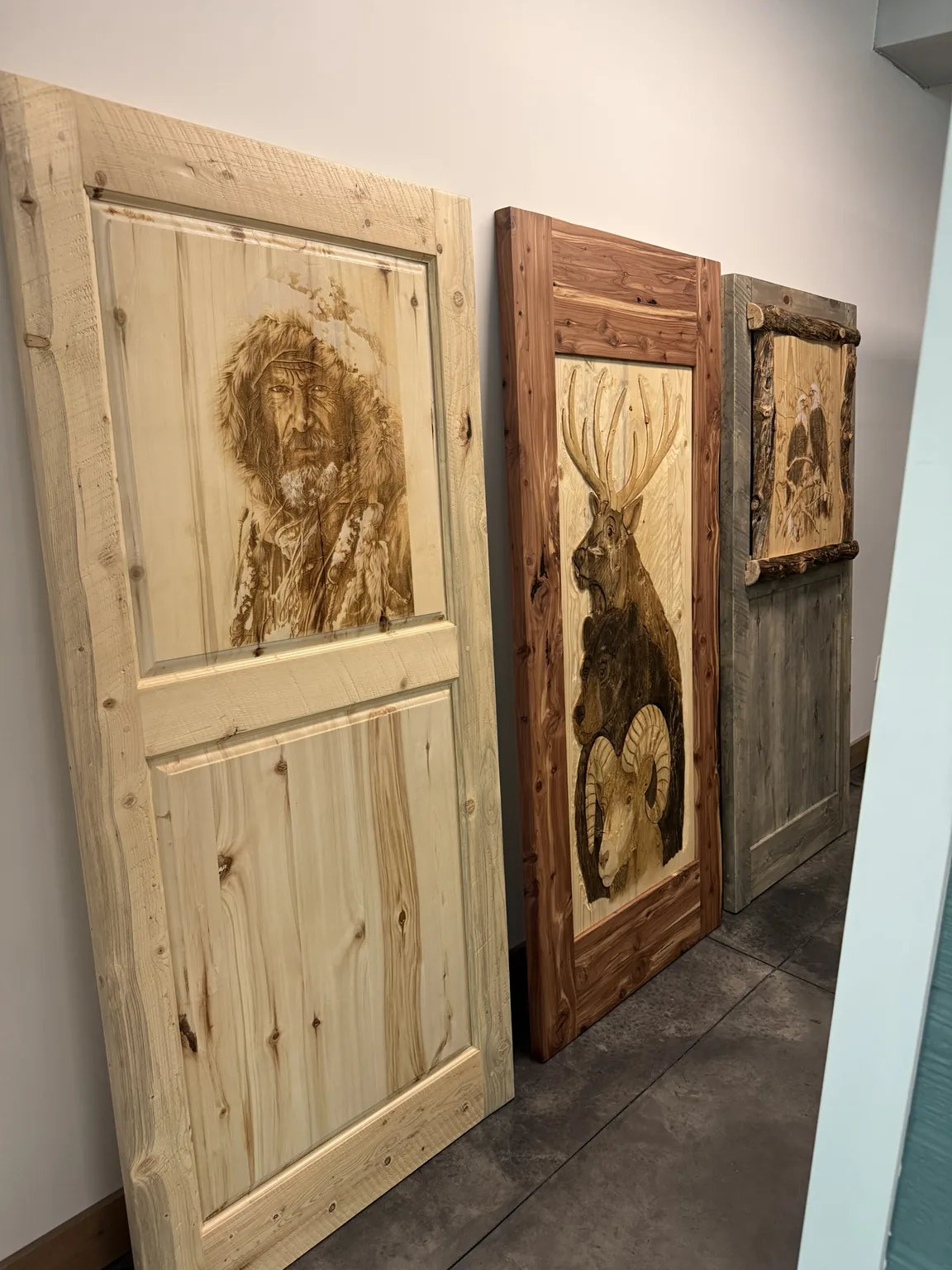 Custom doors displayed by Wet Mountain Rustics
