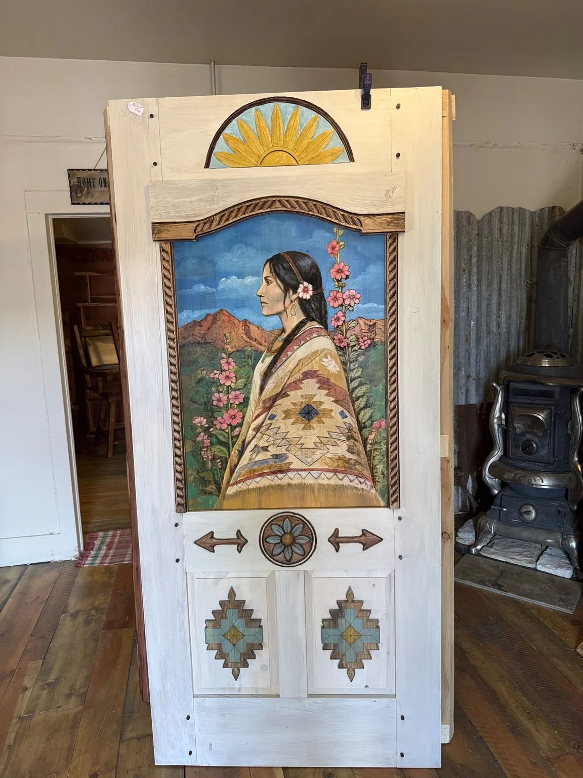 Southwestern carved door during finishing